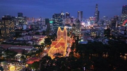 Wall Mural - Aerial view of Notre Dame Cathedral or Duc Ba church, special worship place in central of Ho Chi Minh city. Before Christmas Day in Vietnam.