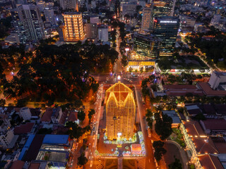 Wall Mural - Aerial view of Notre Dame Cathedral or Duc Ba church, special worship place in central of Ho Chi Minh city. Before Christmas Day in Vietnam.