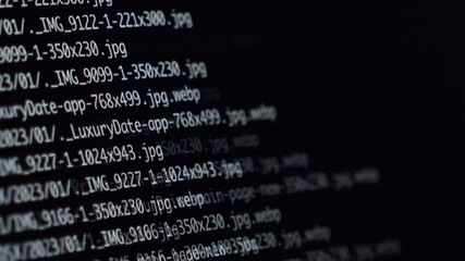 rapid movement of code lines on a dark screen, showcasing dynamic programming activity and real-time scrolling visualization
