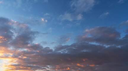 Wall Mural - sunset sky background. beautiful evening sunset sky with clouds.