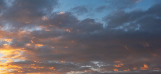 Wall Mural - sunset sky background. beautiful evening sunset sky with clouds.