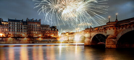 Wall Mural - fireworks over bridge Pont Neuf and Seine river with old houses, Paris, France