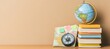 © Babycrab - Globe, compass, map, and books on a desk.
