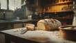 © arthit - Freshly Baked Loaf of Bread Being Sliced in Kitchen