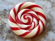 © Ishika - colorful spiral candy on a marble surface