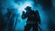© jureephorn - A firefighter using a thermal imaging camera inside a dark and smoky building