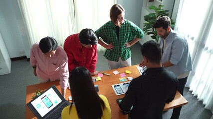 Wall Mural - top view of skilled ui designer brainstorming by writing on sticky notes and planning about ux uo de
