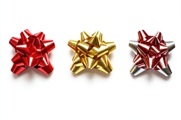 Decorative gift bows in red, gold, and silver arranged in a row on a white background