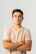 © Mikhail Taratonov - Young confident man in T-shirt close-up on a white background, copy space