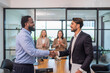 © Verin - business men doing hands shake for the future business cooperation,multiracial business partnership meeting in the office room