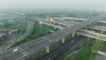 Wall Mural - Aerial view modern city transport junction cross road with car transport industry