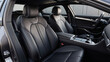 © Rhony - The front seats and headrests in this modern car interior are incredibly comfortable, with sleek black leather upholstery and an elegant design perfect for a luxurious ride