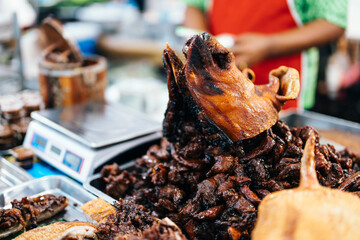 Wall Mural - Delicious grilled pork at Asian markets reflects broader trends towards healthy living and environmental awareness as consumers opt for natural, chemical-free foods.