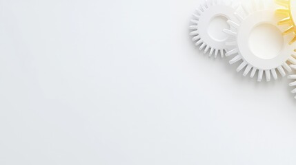 White and yellow gears on white background.