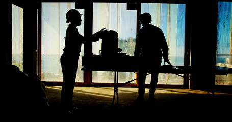 Poster - Teamwork, silhouette or people on construction site for engineering project or property management. Architecture maintenance, dawn or contractors in dark for building renovation or safety development