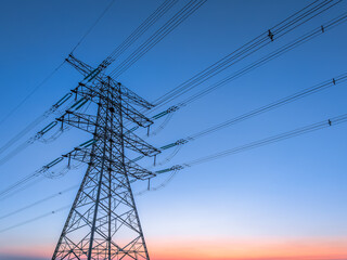 high voltage electric tower and natural scenery at dusk