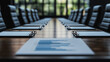 © CreativeIMGIdeas - A group of people are sitting at a long table with blue and white papers