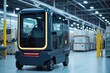 © tatchaihot - Compact Guided Vehicle in Modern Factory Setting Showcasing Advanced Technology and Automation for Material Transport and Efficiency Enhancement