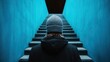 © familymedia - A person in a beanie and dark coat walks up a blue stairway, leading into a mysterious, unseen destination, evoking curiosity and intrigue.