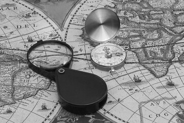Wall Mural - classic round compass on background of old vintage map of world