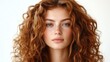 © Serhii - Captivating Portrait of a Young Woman with Brown Curls, Gazing into the Camera Against a Clean White Background