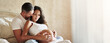 © peopleimages.com - Relax, pregnancy and couple in bedroom in home with love, bonding and marriage commitment to family. Rest, maternity leave and man embracing pregnant woman for prenatal care connection in apartment.