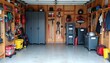 © Elena - Tidy garage featuring large storage bins for tools, sports equipment, and seasonal decorations