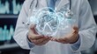 © WS Studio 1985 - Doctor Holding Virtual Healthcare Concept with Digital Brain Model