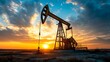 © atar - Oil pump jack at sunset. Concept of fossil fuels, energy, and industry.