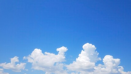 White fluffy clouds floating in a clear blue sky on a sunny summer day, fluffy, heaven
