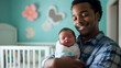 © mahamad - A father cradling his newborn baby son in a nursery.