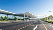 © KayKai - A large airport terminal with a long road in front of it