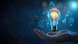 © Gambar Upi - Light bulb with innovation icons in businessman’s hand. Concept of business creativity and solutions