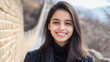 © Ari - Indian girl wearing fur coat on traveling to the great wall of china