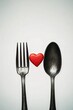 © Laily - Romantic Dinner Concept Red Heart Between Fork Spoon