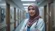 © Naturalpict - muslim Female doctor standing in hospital corridor