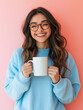 © 수동 김 - A smiling woman wearing glasses and holding a coffee mug in front of a colorful background, dressed in a sweatshirt.
