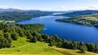 © Supanat - Scenic Panorama Of Vast Lake And Verdant Countryside Under Bright Blue Sky : Generative AI