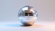 © Guruji - A shiny silver ball featuring a reflective mirror on its top surface, creating a striking visual effect.