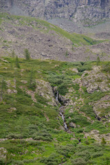 Wall Mural - Waterfall between the first and second Karakol lakes. Altai Republic, Russia