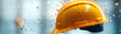 © Alex - A close-up of a yellow hard hat suspended in mid-air with particles flying around.
