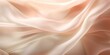 © Graphic Warrior - Light beige color silk satin texture surface decorative background. Romantic soft fashion template scene