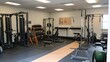 © arisa - modern fitness center gym weight room interior