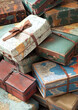 © CreativePulse - Vintage travel themed gift paper and suitcases create nostalgic atmosphere