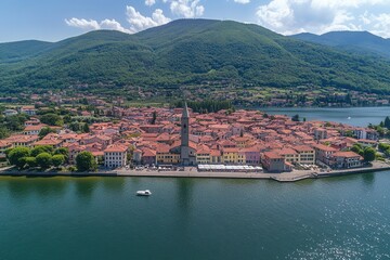 The old town of Varena on Lake Como, seen from the air with the mountains in the distance, is in Italy, Europe