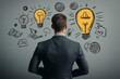 © McFly - a man standing with his back to us thinking up new ideas, around him are notes, notes, a glowing, burning light bulb, symbolizing a good idea found, thought up