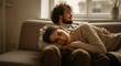 © Konstiantyn Zap - Young caucasian couple relaxing on couch in cozy living room