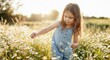 © Konstiantyn Zap - Young caucasian girl enjoying nature in a flower meadow at sunset