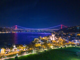 Istanbul Bosphorus Bridge Beykoz at Night: A Stunning Aerial View A breathtaking aerial view of the Bosphorus Bridge spanning Istanbul's vibrant cityscape at night. Anatolian Fortress (Anadolu Hisari)
