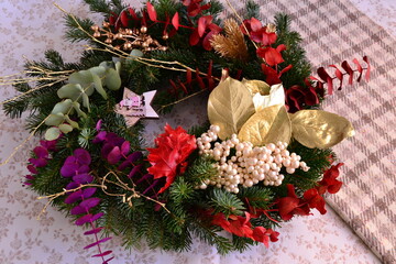 Christmas wreath decoration pine tree brunches golden and red leaves mistletoe berries eucaliptus, colorful new year centerpiece arrangement handmade holidays crafting ideas, green brown rustic color